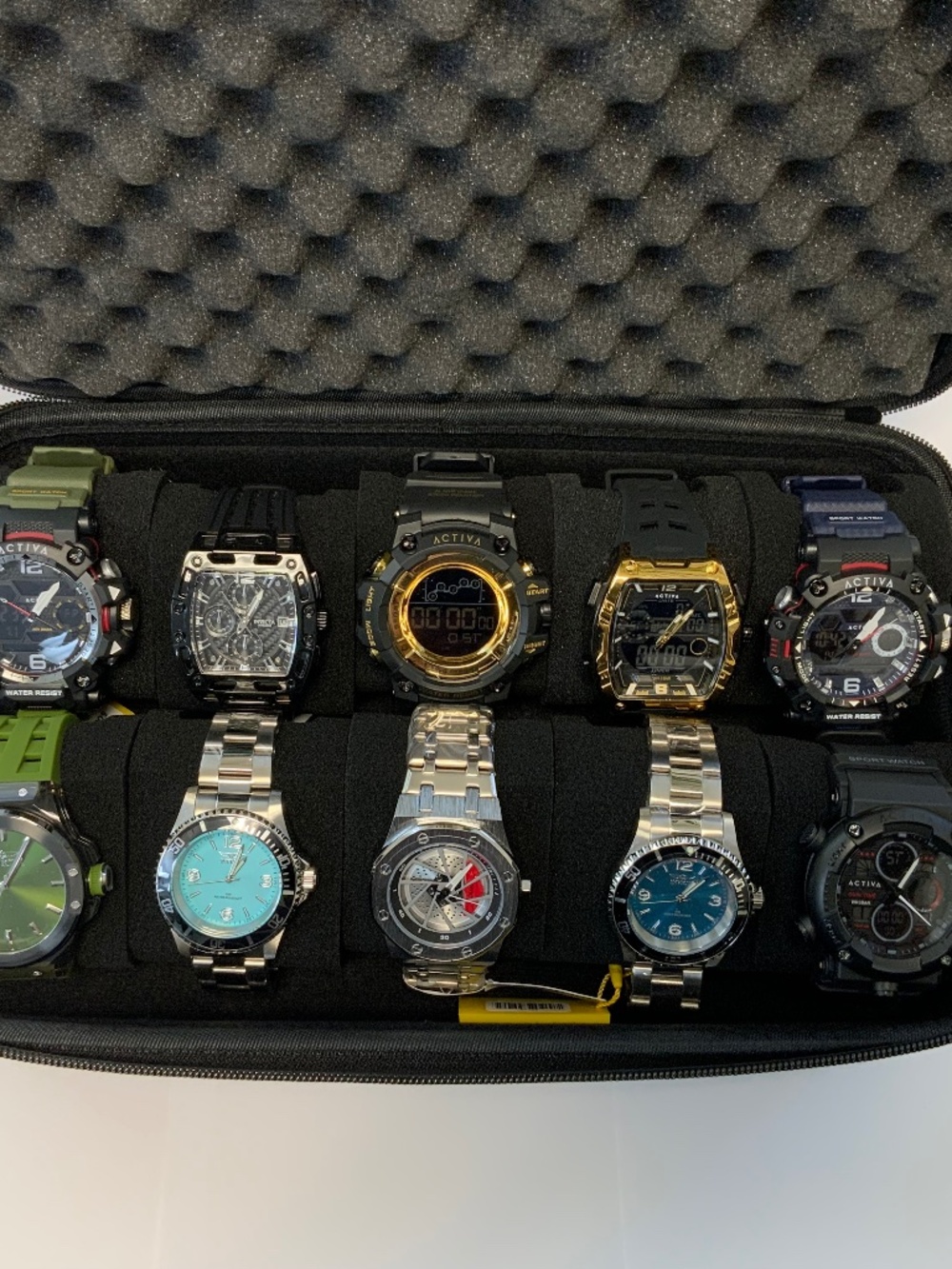 10 INVICTA WATCHES WITH HARD SHELL CASE. ALL NEW AND WITH THE BOXES AND TAGS